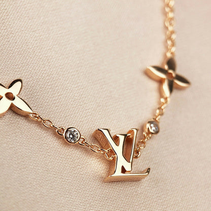 [Select]STAR AND SUN 7 MOTIFS GOLD BRACELET