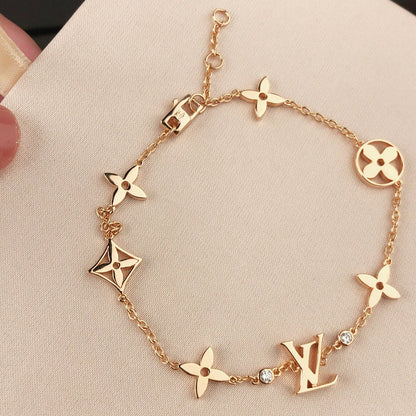 [Select]STAR AND SUN 7 MOTIFS GOLD BRACELET