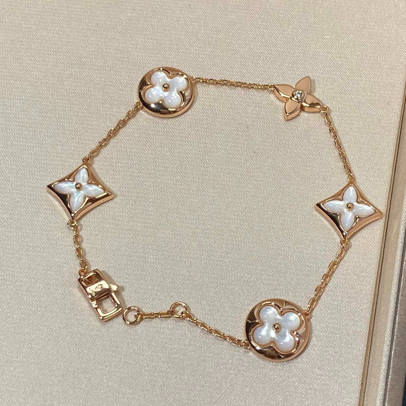 [Select]STAR AND SUN 5 MOTIF MOP PINK GOLD BRACELET