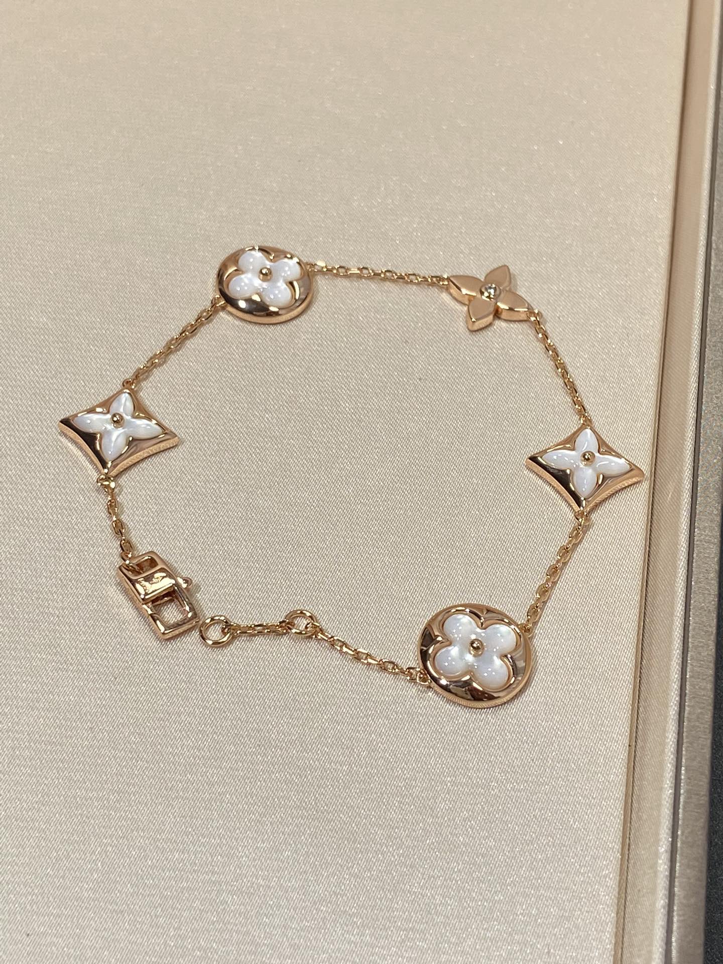 [Select]STAR AND SUN 5 MOTIF MOP PINK GOLD BRACELET