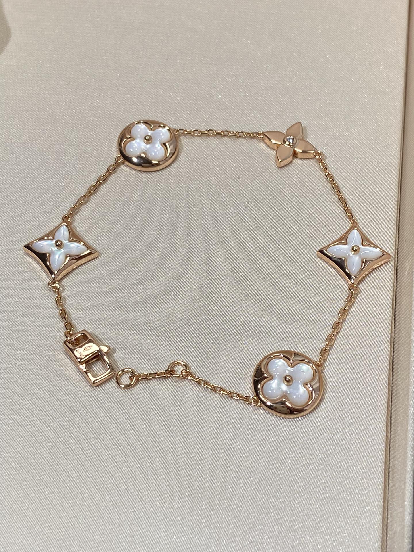 [Select]STAR AND SUN 5 MOTIF MOP PINK GOLD BRACELET