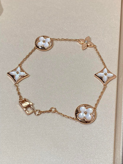 [Select]STAR AND SUN 5 MOTIF MOP PINK GOLD BRACELET