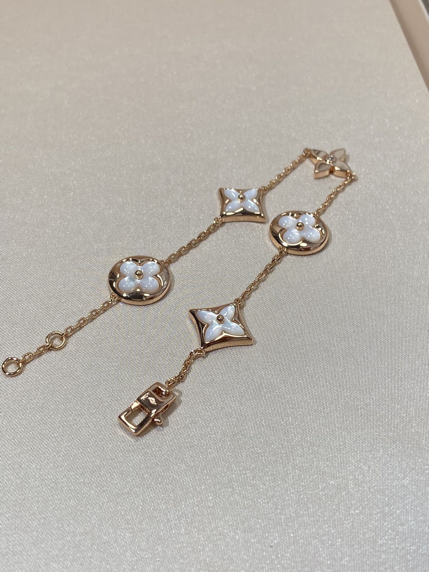 [Select]STAR AND SUN 5 MOTIF MOP PINK GOLD BRACELET