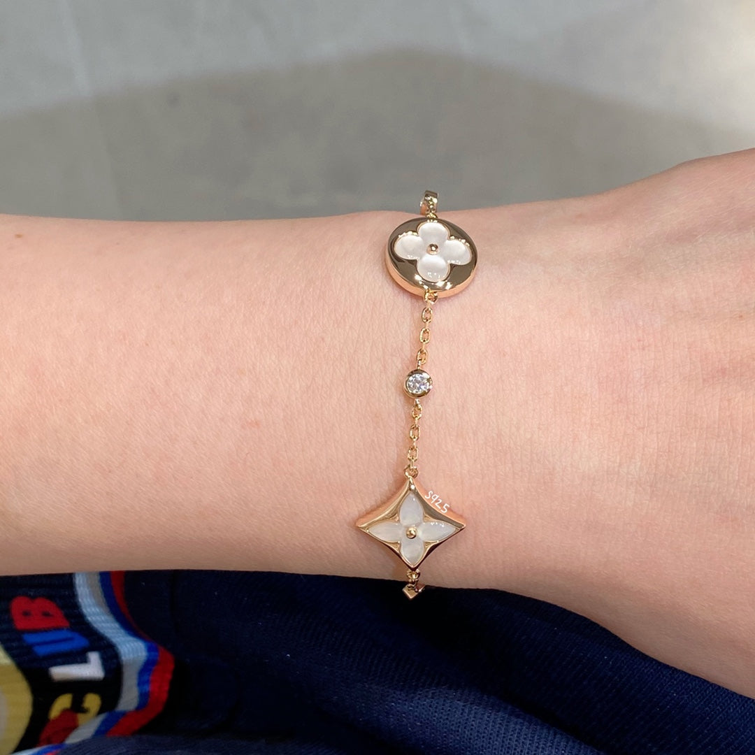 [Select]STAR AND SUN 4 MOTIF WHITE MOP PINK GOLD BRACELET